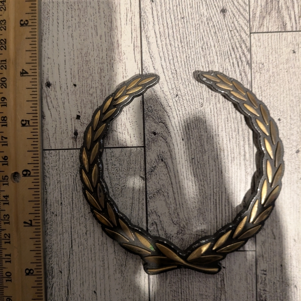 Cadillac Elegant Gold Wreath Emblem